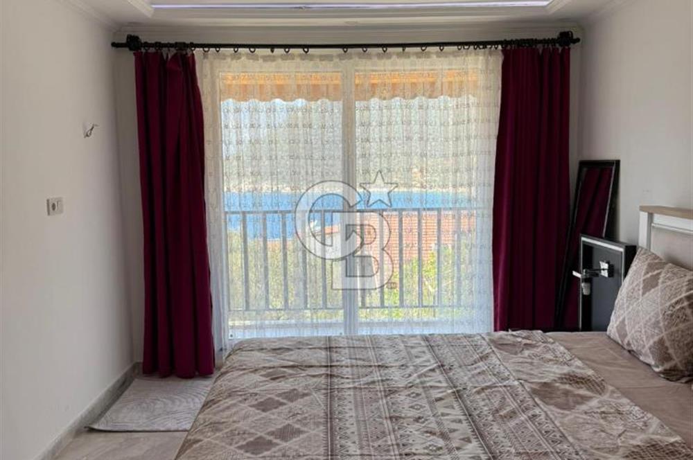 CB Giz'den Kalkan Kalamar'da 1+1 deniz manzaralı daire