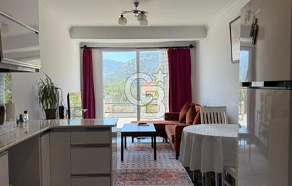 CB Giz'den Kalkan Kalamar'da 1+1 deniz manzaralı daire