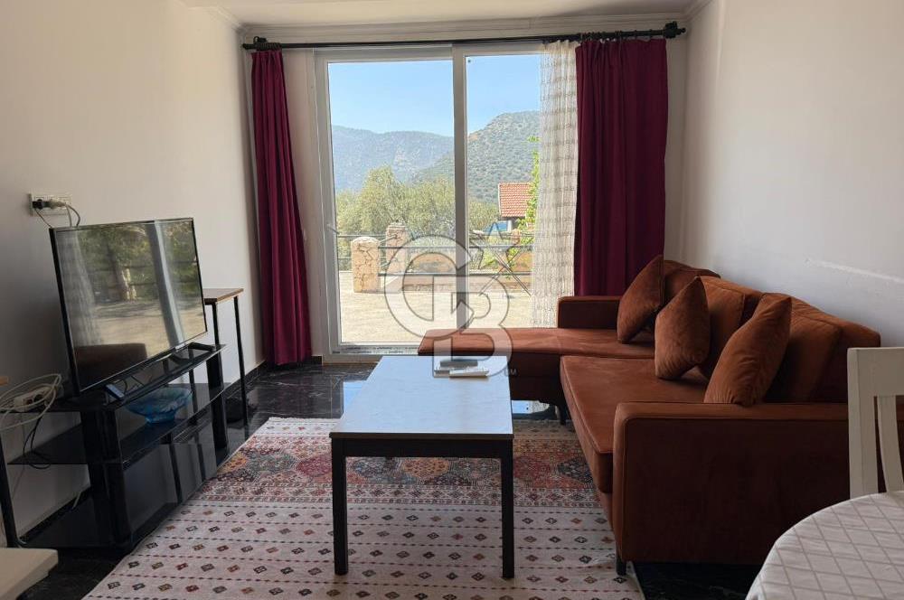 CB Giz'den Kalkan Kalamar'da 1+1 deniz manzaralı daire
