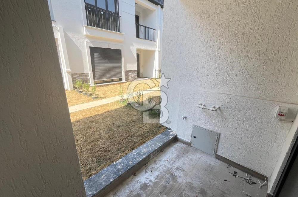 GÜRE ÇAMLIBELDE BAHÇE KULLANIMLI HAVUZLU SATILIK 1+1 DAİRE