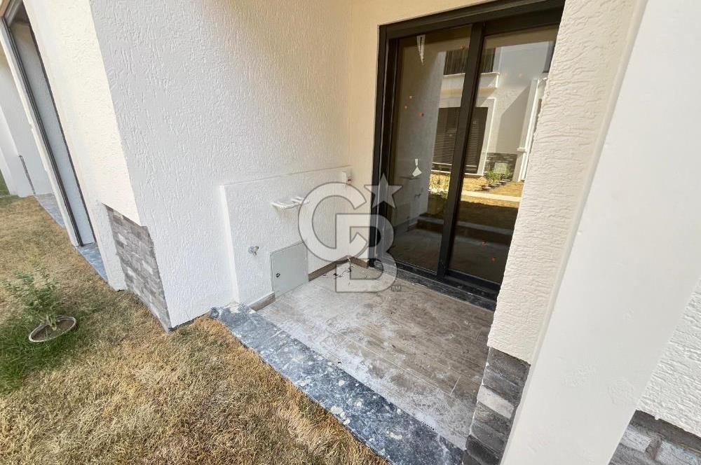 GÜRE ÇAMLIBELDE BAHÇE KULLANIMLI HAVUZLU SATILIK 1+1 DAİRE
