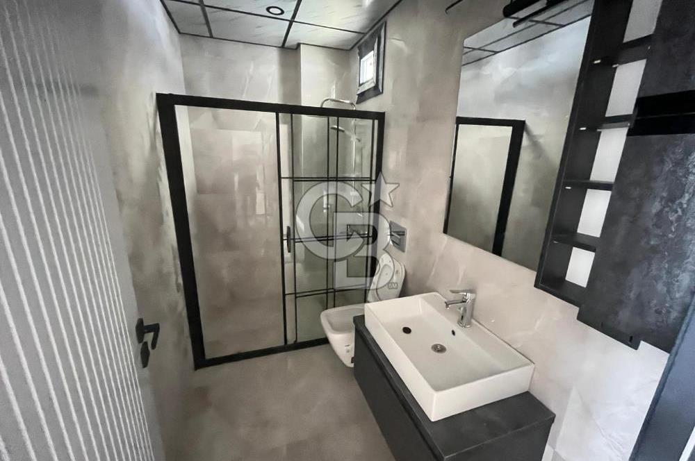 GÜRE ÇAMLIBELDE BAHÇE KULLANIMLI HAVUZLU SATILIK 1+1 DAİRE
