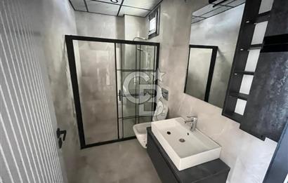 GÜRE ÇAMLIBELDE BAHÇE KULLANIMLI HAVUZLU SATILIK 1+1 DAİRE