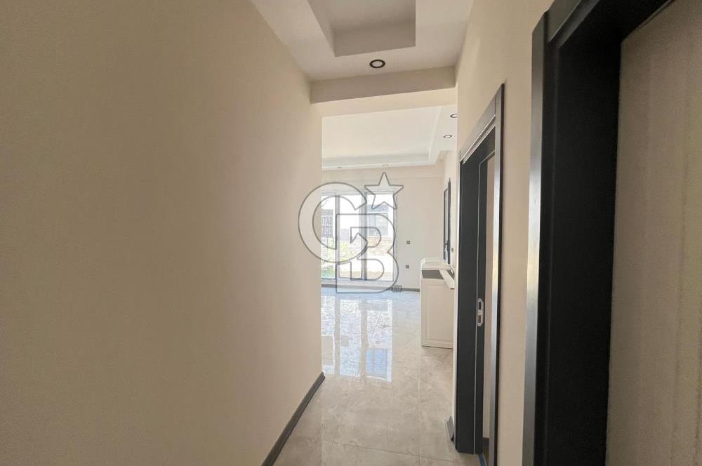 GÜRE ÇAMLIBELDE BAHÇE KULLANIMLI HAVUZLU SATILIK 1+1 DAİRE