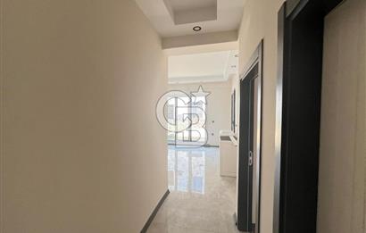 GÜRE ÇAMLIBELDE BAHÇE KULLANIMLI HAVUZLU SATILIK 1+1 DAİRE