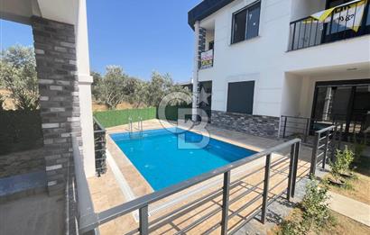GÜRE ÇAMLIBELDE BAHÇE KULLANIMLI HAVUZLU SATILIK 1+1 DAİRE