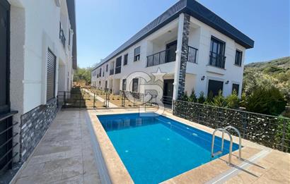GÜRE ÇAMLIBELDE BAHÇE KULLANIMLI HAVUZLU SATILIK 1+1 DAİRE