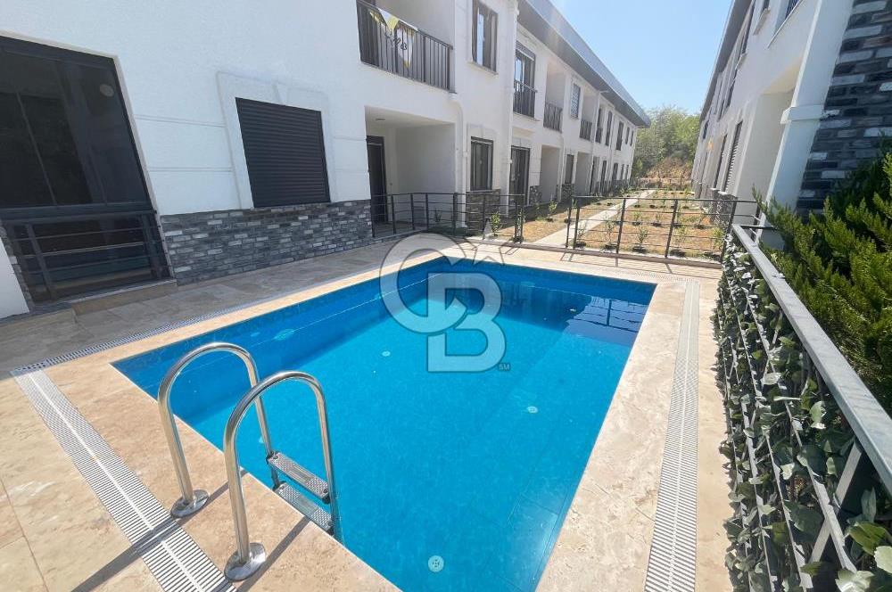 GÜRE ÇAMLIBELDE BAHÇE KULLANIMLI HAVUZLU SATILIK 1+1 DAİRE