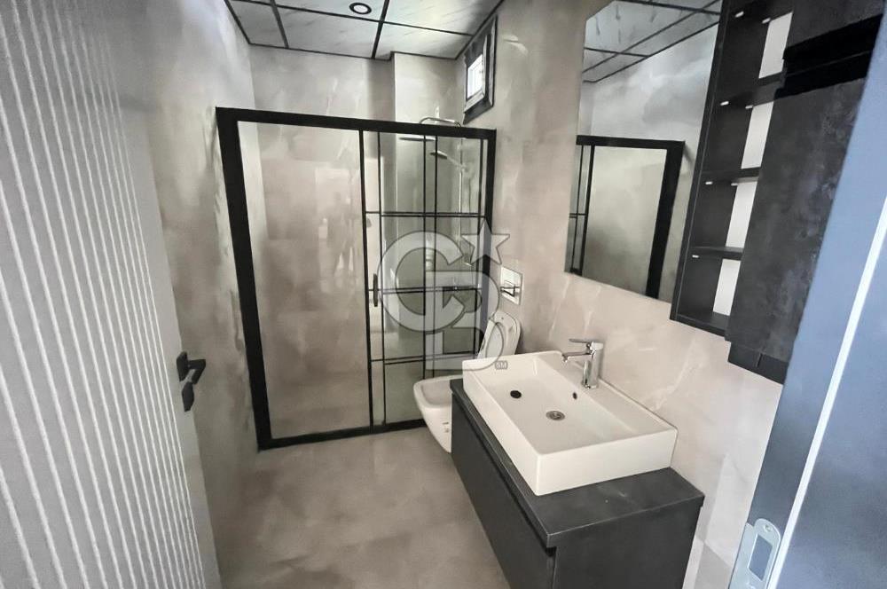 GÜRE ÇAMLIBELDE BAHÇE KULLANIMLI HAVUZLU SATILIK 1+1 DAİRE
