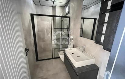 GÜRE ÇAMLIBELDE BAHÇE KULLANIMLI HAVUZLU SATILIK 1+1 DAİRE