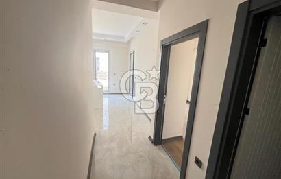 GÜRE ÇAMLIBELDE BAHÇE KULLANIMLI HAVUZLU SATILIK 1+1 DAİRE