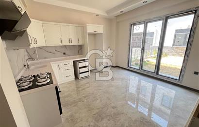 GÜRE ÇAMLIBELDE BAHÇE KULLANIMLI HAVUZLU SATILIK 1+1 DAİRE