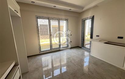 GÜRE ÇAMLIBELDE BAHÇE KULLANIMLI HAVUZLU SATILIK 1+1 DAİRE
