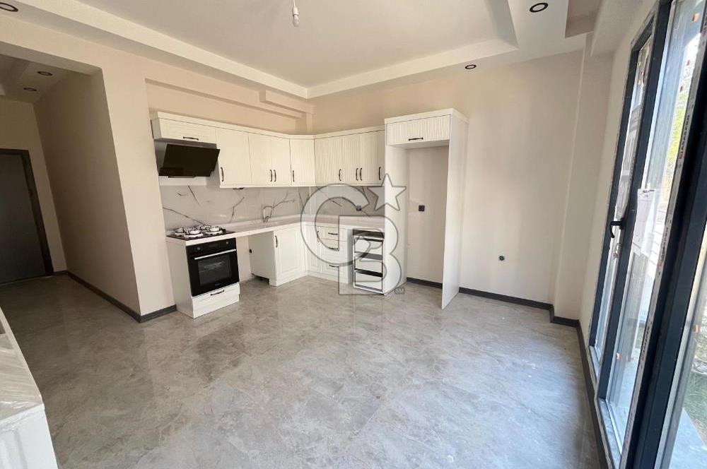 GÜRE ÇAMLIBELDE BAHÇE KULLANIMLI HAVUZLU SATILIK 1+1 DAİRE