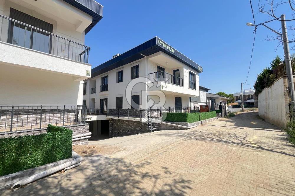 GÜRE ÇAMLIBELDE BAHÇE KULLANIMLI HAVUZLU SATILIK 1+1 DAİRE