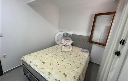 KUŞADASI MERKEZ'DE SATILIK 1+1 bAHÇE KATI