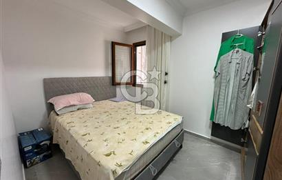 KUŞADASI MERKEZ'DE SATILIK 1+1 bAHÇE KATI