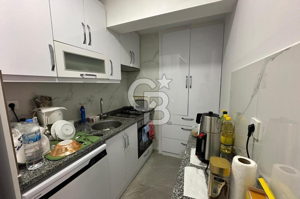 KUŞADASI MERKEZ'DE SATILIK 1+1 bAHÇE KATI