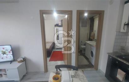 HARMANDALI'DA KATİP ÇELEBİ ÜNV. YAKINI 1+1 EŞYALI SATILIK DAİRE