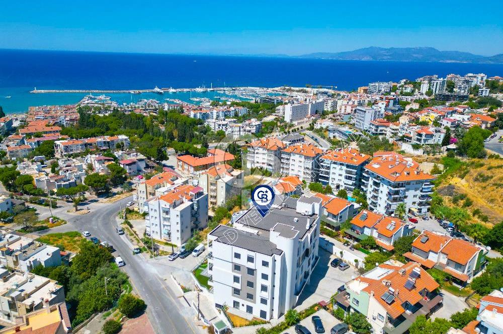 KUSADASINDA MARİNAYA YÜRÜME MESAFESINDE OLAN YENI BINADA 3+1 BAHÇE KATI