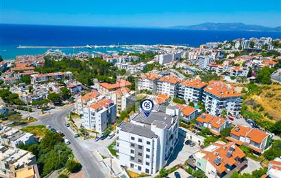 KUSADASINDA MARİNAYA YÜRÜME MESAFESINDE OLAN YENI BINADA 3+1 BAHÇE KATI