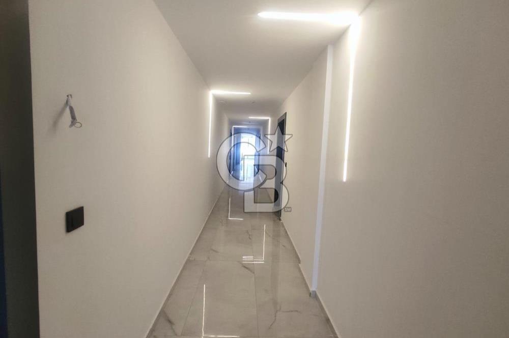 DİDİM AKBÜK SATILIK 1+1 DENİZE 300m CADDE ÜZERİ FIRSAT DAİRE