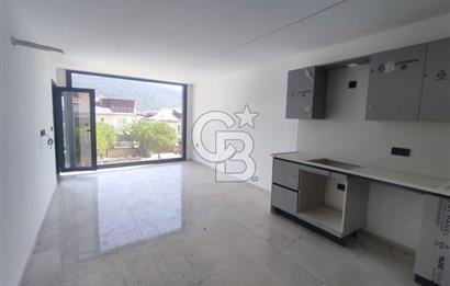 DİDİM AKBÜK SATILIK 1+1 DENİZE 300m CADDE ÜZERİ FIRSAT DAİRE