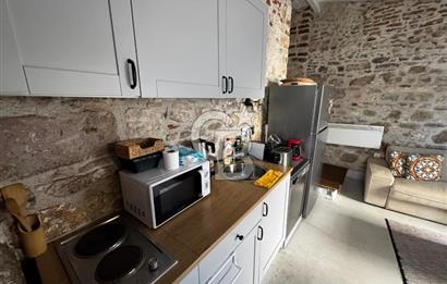 AYVALIK KÜÇÜKKÖYDE HAZIR GELİRLİ AIRBNB İŞLETMELİ KOMPLE MÜLK