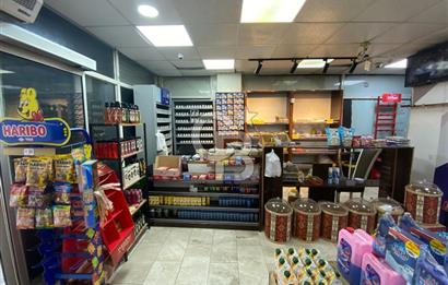 KARŞIYAKA BAHÇELİEVLER'DE YÜKSEK CİROLU DEVREN KİRALIK DÜKKAN