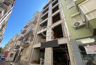 Karşıyaka Merkezi Lokasyonda 1+1 Satılık Daire