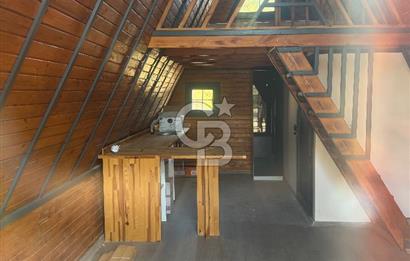 Bornova Yakaköyde 300 m² koop.hisseli arsa +1+1 bungalov ev