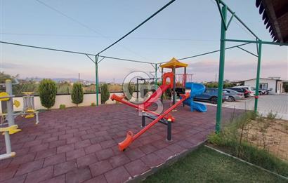 SEFERİHİSAR DOĞANBEY SAHİL SİTESİNDE 1+1 DAİRE