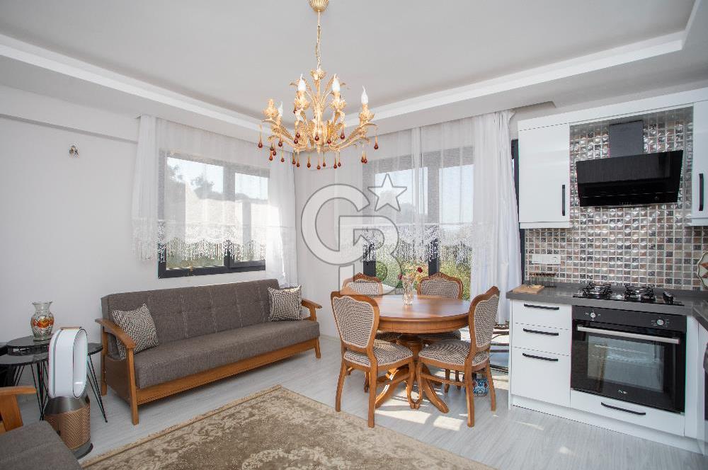 Yenifoça'da Eşyalı Kiralık Bahçe Katı 1+1 Daire