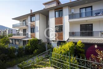 Yenifoça'da Eşyalı Kiralık Bahçe Katı 1+1 Daire