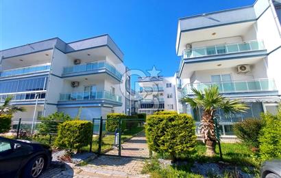 KUŞADASI DAVUTLAR SİTE İÇİNDE SAHİLE YAKIN YENİ 1+1 SATILIK DAİRE 