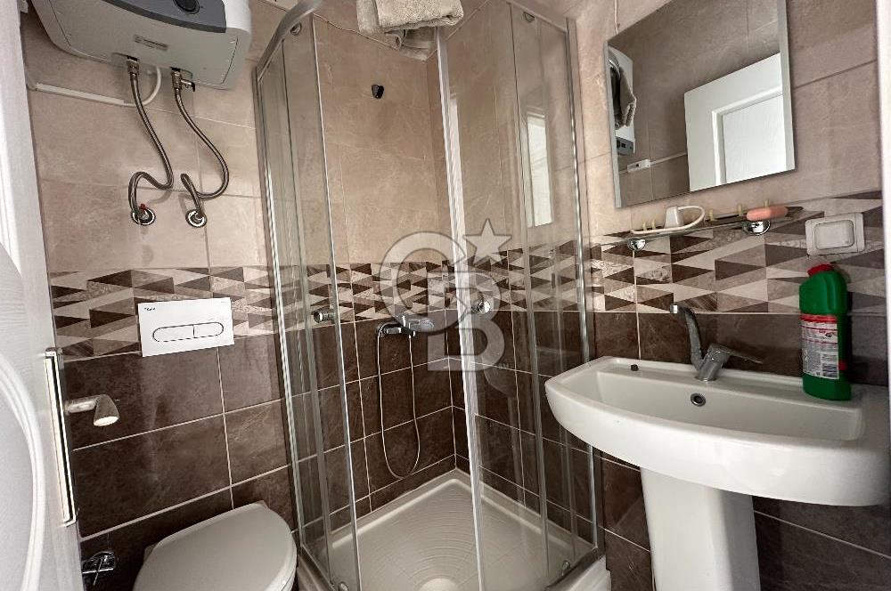 BOZCAADA CUMHURİYET MAHALLESİ’NDE DOĞAL TAŞ EV ve 1.768 m² ARSA