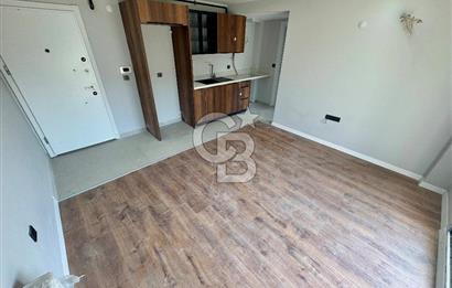 GARDEN BORNOVA BÜYÜK BAHÇELİ HAVUZLU SPOR SALONLU 1+1