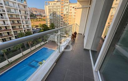 SOYAK OKSİJEN'DE SATILIK HAVUZ MANZARALI 1+1 DAİRE