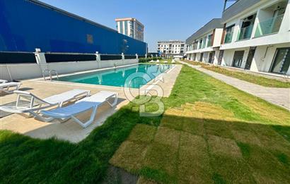 GARDEN BORNOVA SITESINDE EMSALSİZ ÇİFT CEPHELİ 1+1 DAİRE