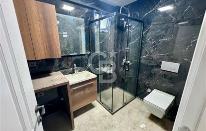 GARDEN BORNOVA SITESINDE EMSALSİZ ÇİFT CEPHELİ 1+1 DAİRE