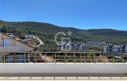 Didim Akbük'de Doğa ve Deniz Manzaralı Geniş Çatı Dubleksi