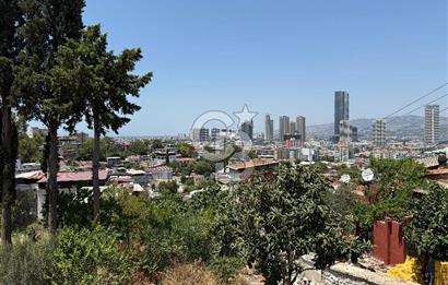 KONAK GÜNEY MAHALLESİNDE KÖRFEZ MANZARALI SATILIK ARSA