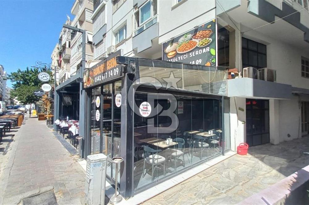  İzmir Bostanlı’da Satılık Çift Dükkan  Yüksek Tabela Değeri!