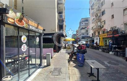 İzmir Bostanlı’da Satılık Çift Dükkan  Yüksek Tabela Değeri!