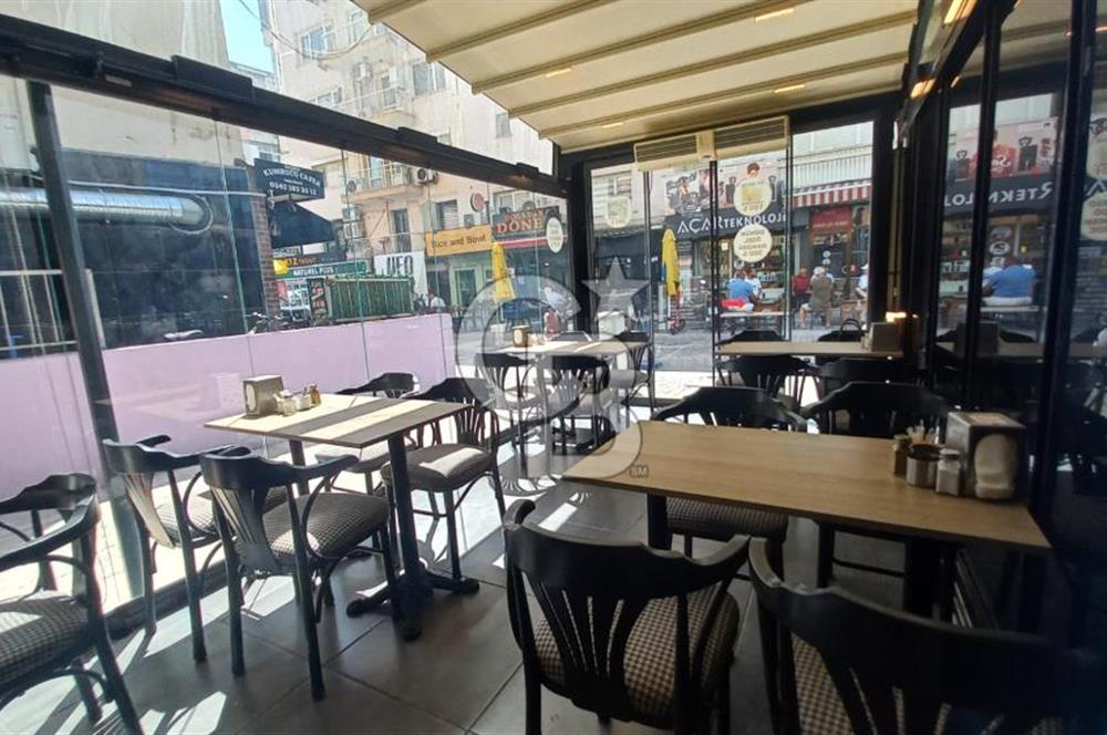  İzmir Bostanlı’da Satılık Çift Dükkan  Yüksek Tabela Değeri!