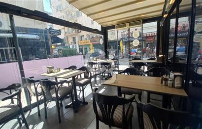  İzmir Bostanlı’da Satılık Çift Dükkan  Yüksek Tabela Değeri!