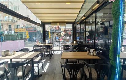  İzmir Bostanlı’da Satılık Çift Dükkan  Yüksek Tabela Değeri!