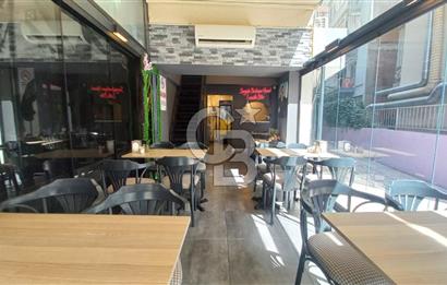  İzmir Bostanlı’da Satılık Çift Dükkan  Yüksek Tabela Değeri!