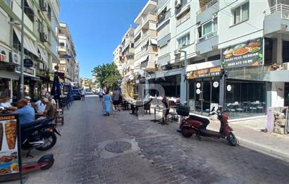  İzmir Bostanlı’da Satılık Çift Dükkan  Yüksek Tabela Değeri!