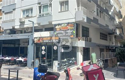  İzmir Bostanlı’da Satılık Çift Dükkan  Yüksek Tabela Değeri!